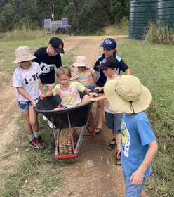Farmer Olympics wheelbarrow race